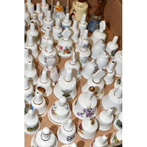 344 - THREE BOXES OF PORCELAIN BELL ORNAMENTS, over two hundred miniature holiday souvenir bells together ... 