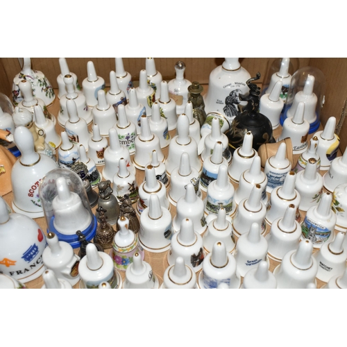 344 - THREE BOXES OF PORCELAIN BELL ORNAMENTS, over two hundred miniature holiday souvenir bells together ... 