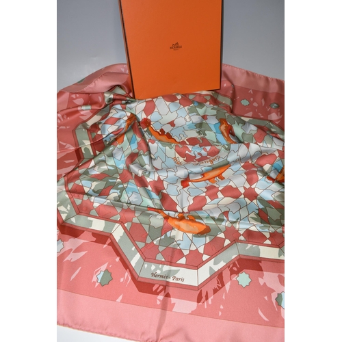 351 - A BOXED HERMÉS PRINTED SILK SCARF, comprising a Dusty Rose/Multi-Col.2 'Sous Les Orangers' design si... 