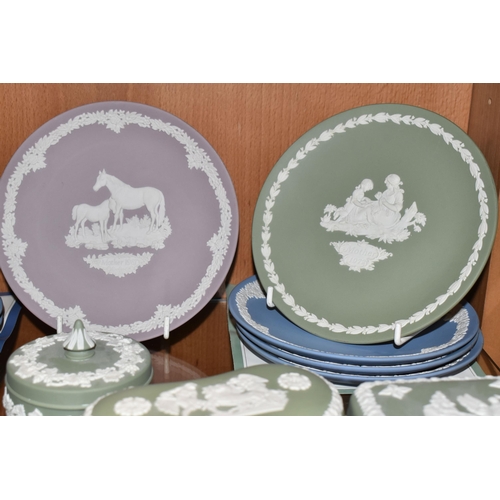 358 - A LARGE COLLECTION OF WEDGWOOD JASPERWARE CHRISTMAS PLATES AND GIFTWARE, comprising fourteen Christm... 