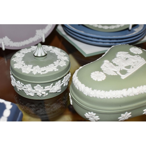 358 - A LARGE COLLECTION OF WEDGWOOD JASPERWARE CHRISTMAS PLATES AND GIFTWARE, comprising fourteen Christm... 