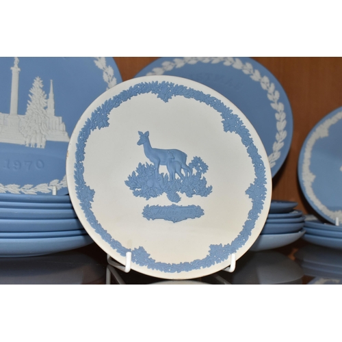 358 - A LARGE COLLECTION OF WEDGWOOD JASPERWARE CHRISTMAS PLATES AND GIFTWARE, comprising fourteen Christm... 