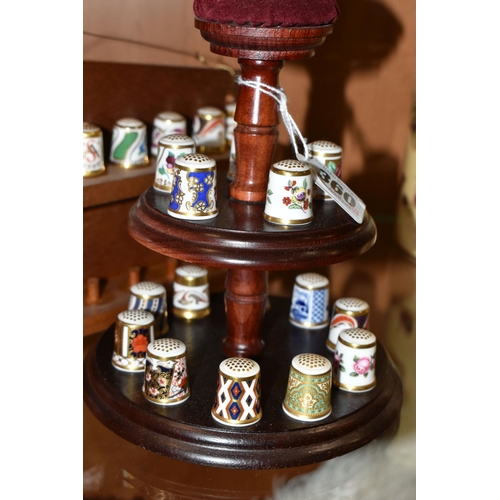 360 - A COLLECTION OF ROYAL CROWN DERBY PORCELAIN THIMBLES, comprising fifteen Royal Crown Derby thimbles ... 