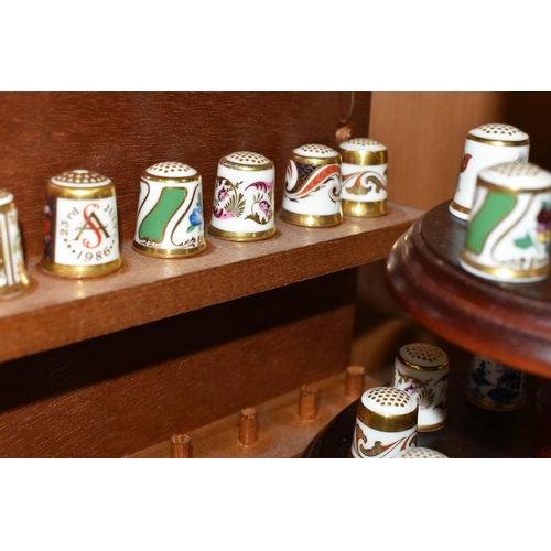 360 - A COLLECTION OF ROYAL CROWN DERBY PORCELAIN THIMBLES, comprising fifteen Royal Crown Derby thimbles ... 