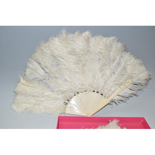 362 - A COLLECTION OF TEN LATE 19TH AND EARLY 20TH CENTURY FANS, comprising a large cream coloured Ostrich... 