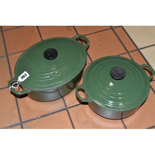 363 - TWO LE CREUSET CACTUS GREEN CASSEROLE DISHES, comprising an oval covered cast iron casserole dish  2... 