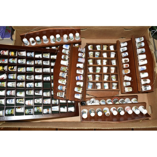 364 - ONE BOX OF CERAMIC THIMBLES, comprising a large collection of over one hundred holiday souvenir thim... 