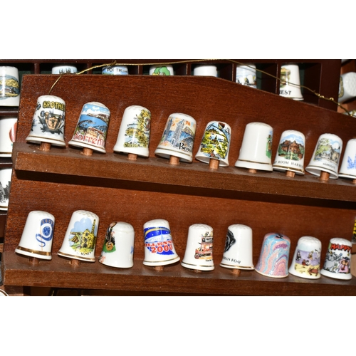 364 - ONE BOX OF CERAMIC THIMBLES, comprising a large collection of over one hundred holiday souvenir thim... 