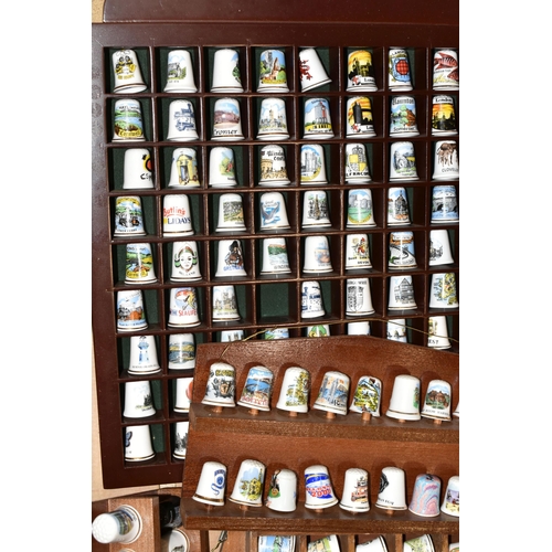 364 - ONE BOX OF CERAMIC THIMBLES, comprising a large collection of over one hundred holiday souvenir thim... 