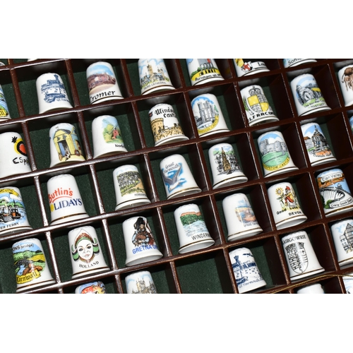 364 - ONE BOX OF CERAMIC THIMBLES, comprising a large collection of over one hundred holiday souvenir thim... 