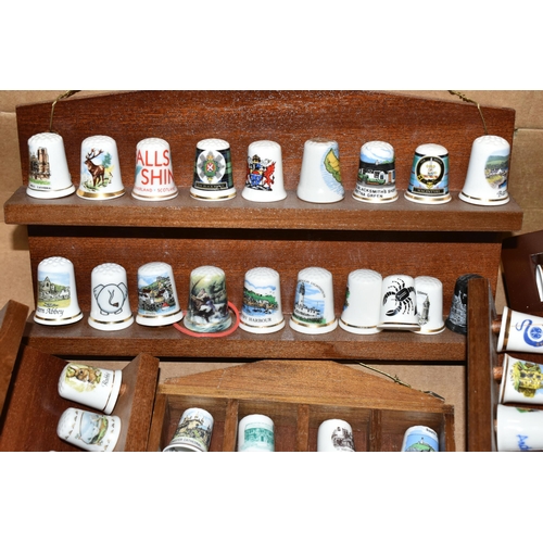 364 - ONE BOX OF CERAMIC THIMBLES, comprising a large collection of over one hundred holiday souvenir thim... 