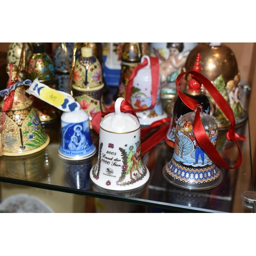 376 - SEVENTEEN CHRISTMAS THEMED BELLS, to include a Capodimonte bell with some restoration to the inside ... 