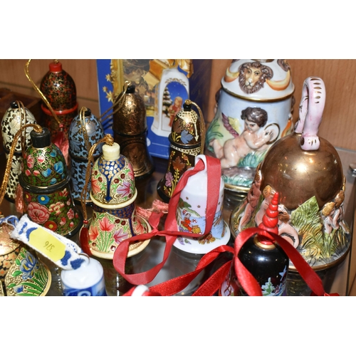 376 - SEVENTEEN CHRISTMAS THEMED BELLS, to include a Capodimonte bell with some restoration to the inside ... 