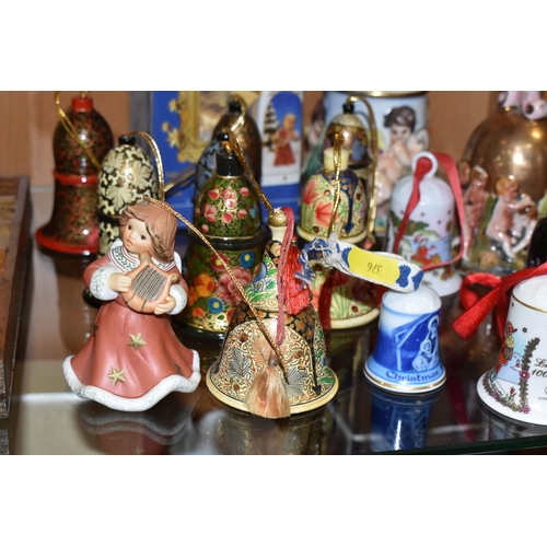 376 - SEVENTEEN CHRISTMAS THEMED BELLS, to include a Capodimonte bell with some restoration to the inside ... 