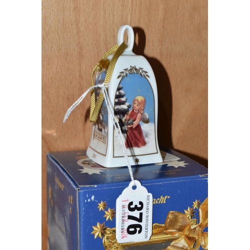 376 - SEVENTEEN CHRISTMAS THEMED BELLS, to include a Capodimonte bell with some restoration to the inside ... 