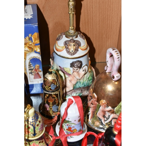 376 - SEVENTEEN CHRISTMAS THEMED BELLS, to include a Capodimonte bell with some restoration to the inside ... 