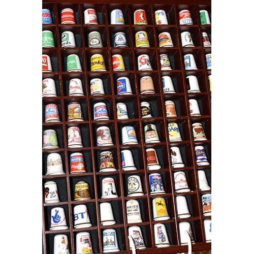 377 - ONE HUNDRED AND TWENTY-EIGHT COLLECTORS THIMBLES, to include Robertsons jam mascot thimbles, Typhoo ... 