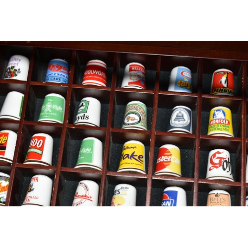 377 - ONE HUNDRED AND TWENTY-EIGHT COLLECTORS THIMBLES, to include Robertsons jam mascot thimbles, Typhoo ... 