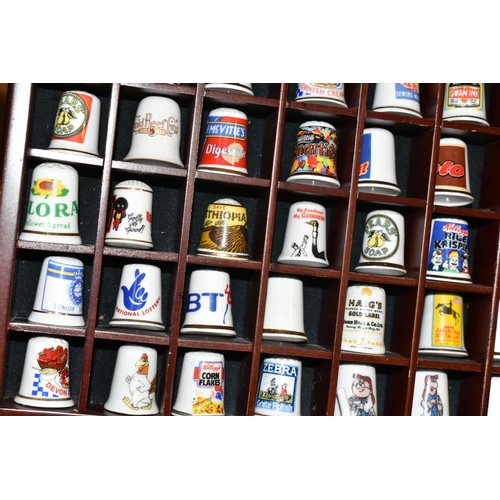 377 - ONE HUNDRED AND TWENTY-EIGHT COLLECTORS THIMBLES, to include Robertsons jam mascot thimbles, Typhoo ... 