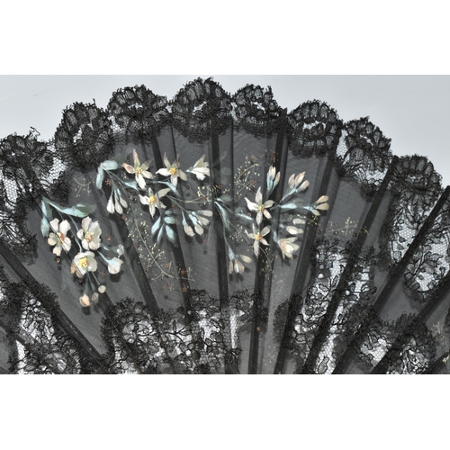 392 - THREE FOLDING FANS, comprising a boxed mother of pearl and black lace fan, with painted flowers and ... 