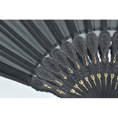 392 - THREE FOLDING FANS, comprising a boxed mother of pearl and black lace fan, with painted flowers and ... 