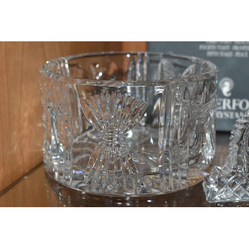 399 - THREE PIECES OF WATERFORD CRYSTAL, to include a boxed The Millennium Collection champagne bottle coa... 