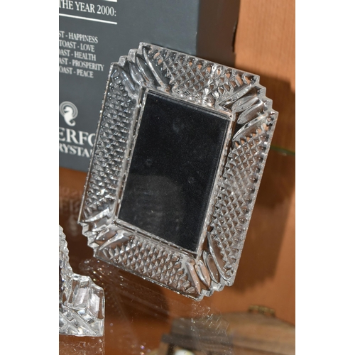 399 - THREE PIECES OF WATERFORD CRYSTAL, to include a boxed The Millennium Collection champagne bottle coa... 