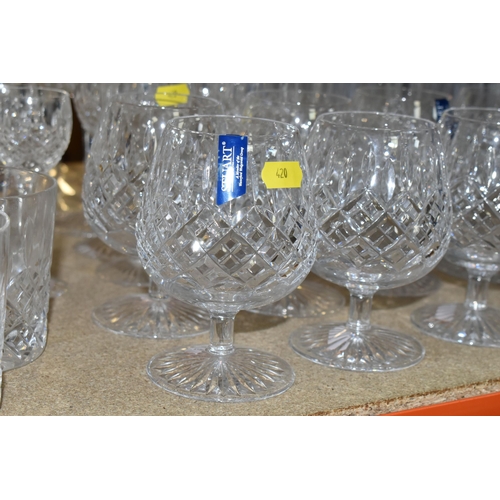 420 - A SELECTION OF STUART DRINKING GLASSES, to include eight brandy balloons, seven white wine, five lar... 