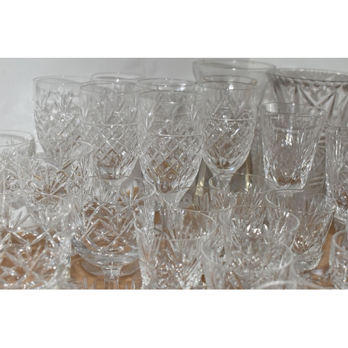 460 - A GROUP OF CUT CRYSTAL AND OTHER GLASS WARE, to include eight sets or part sets of drinking glasses,... 