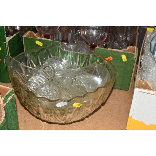 475 - FOUR BOXES OF GLASSWARE, to include punch bowl and cups, drinking glasses, named beer glasses, decan... 