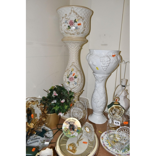 478 - A GROUP OF CABINET PLATES, WALL CLOCKS AND PLANTERS, to include two ceramic planters and stands, thr... 