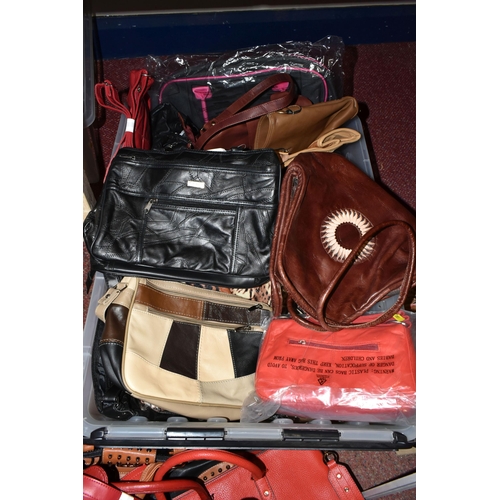 480 - TWO BOXES OF LADIES' HANDBAGS, mostly new and unused, to include twenty four hand bags and shoulder ... 