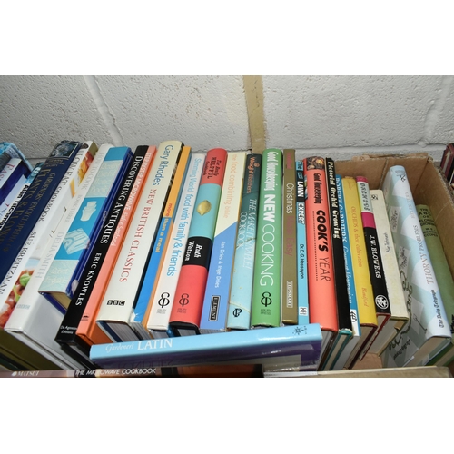 487 - FIVE BOXES OF BOOKS, to include approximately one hundred hardback books, titles include Biggles Fli... 