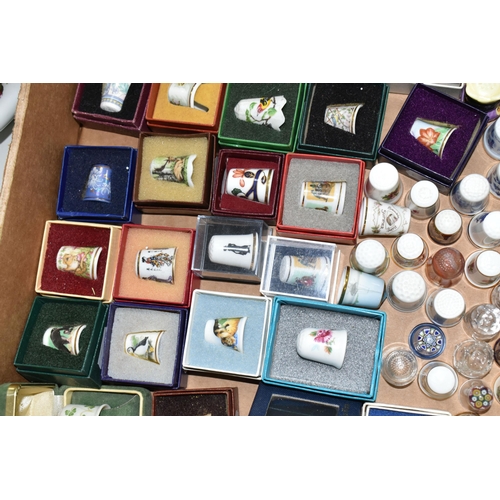 502 - A BOX OF GLASS, CERAMIC AND METAL COLLECTORS THIMBLES, to include forty-three boxed examples, Britis... 