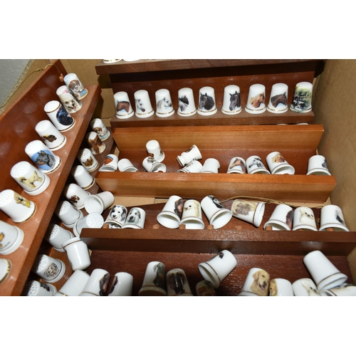 506 - SEVERAL HUNDRED ASSORTED COLLECTORS THIMBLES, to include birds, horses, dogs and tourist themes, bra... 