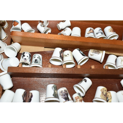 506 - SEVERAL HUNDRED ASSORTED COLLECTORS THIMBLES, to include birds, horses, dogs and tourist themes, bra... 