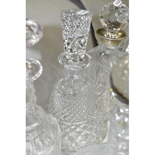 516 - A QUANTITY OF CUT GLASS WARES ETC, to include eleven decanters including a Stuart example, a gilt mo... 