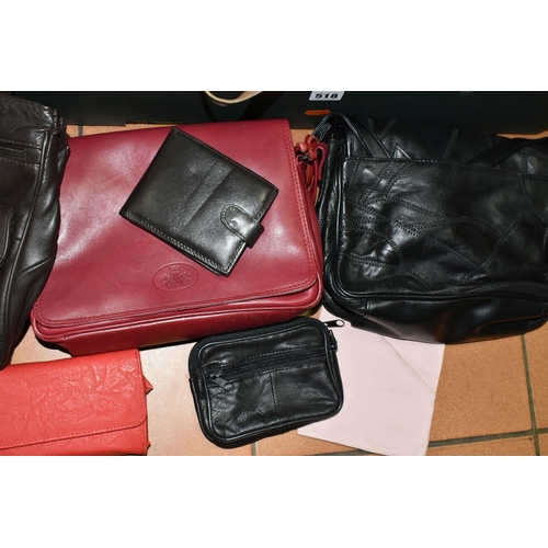 518 - TWO BOXES OF LADIES' HANDBAGS AND PURSES, to include over thirty handbags, a black Radley signature ... 