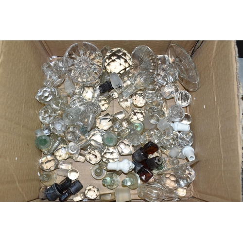 532 - A BOX AND LOOSE GLASS STOPPERS, POSTCARDS AND CERAMICS, to include a collection of crystal, glass an... 