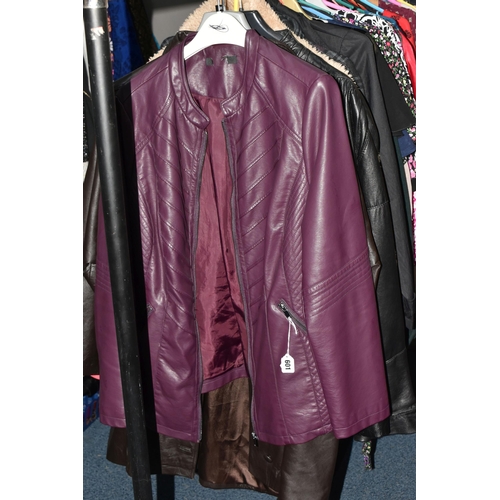 601 - A LARGE QUANTITY OF LADIES' CLOTHING, to include leather jackets, overcoats, blouses, skirts, dresse... 