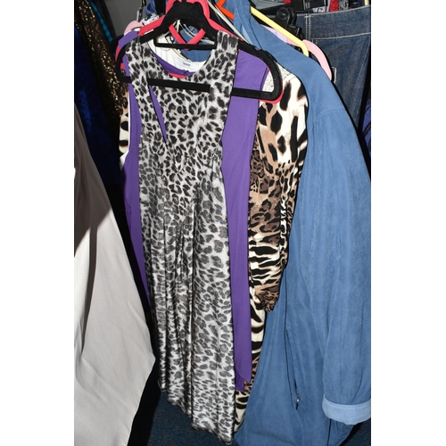 601 - A LARGE QUANTITY OF LADIES' CLOTHING, to include leather jackets, overcoats, blouses, skirts, dresse... 