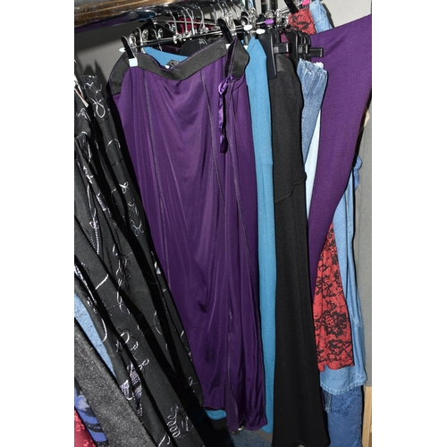 601 - A LARGE QUANTITY OF LADIES' CLOTHING, to include leather jackets, overcoats, blouses, skirts, dresse... 