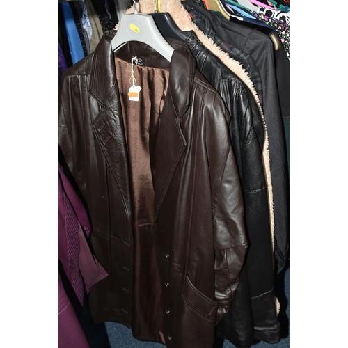 601 - A LARGE QUANTITY OF LADIES' CLOTHING, to include leather jackets, overcoats, blouses, skirts, dresse... 