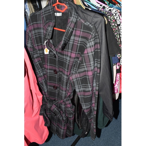 601 - A LARGE QUANTITY OF LADIES' CLOTHING, to include leather jackets, overcoats, blouses, skirts, dresse... 