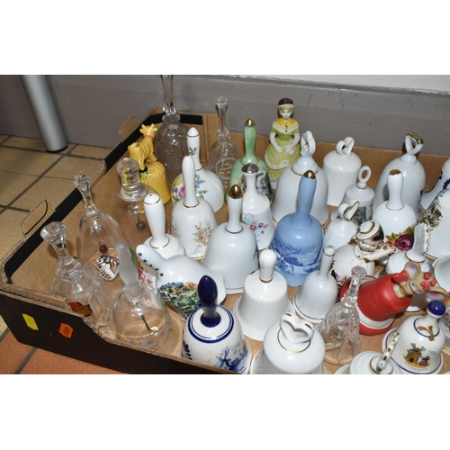 326 - TWO BOXES OF DECORATIVE CERAMIC AND GLASS BELLS, over eighty bells, including crystal examples, figu... 