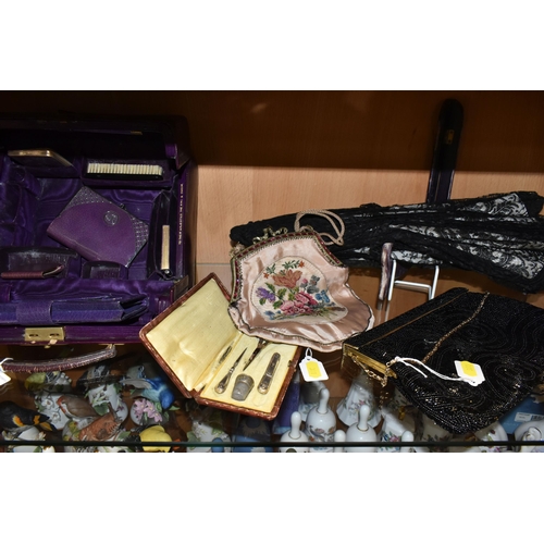 381 - A GROUP OF VINTAGE BAGS, PURSE, VANITY CASE, PARASOL, WALL HANGING AND SEWING ITEMS, to include a pu... 