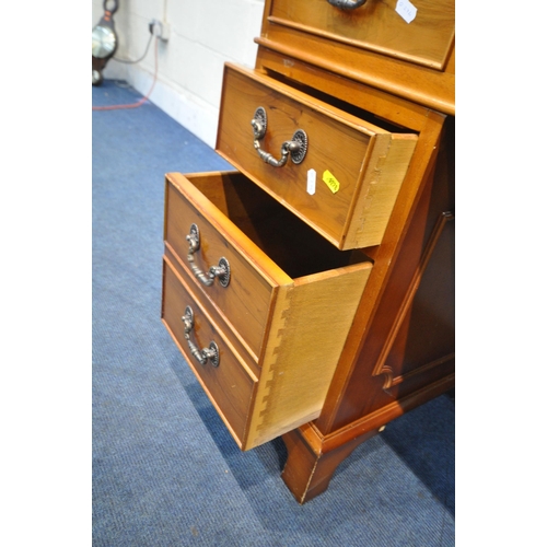 1198 - A 20TH CENTURY YEW WOOD TWIN PEDESTAL DESK, with a green tooled leather writing surface, fitted with... 