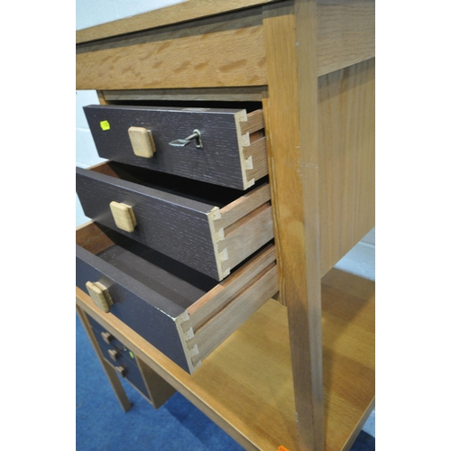 1199 - DOMINO MOBLER, AN OPPOSING PAIR OF MID CENTURY TEAK DESKS, fitted with three drawers, width 105cm x ... 