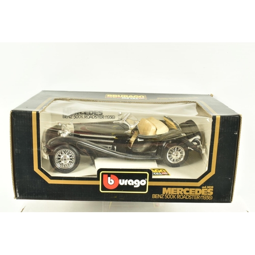 33 - SIX BOXED METAL DIECAST 1:18 SCALE MODEL CARS, to include a Bburago 1961 Jaguar E Coupe in red, mode... 