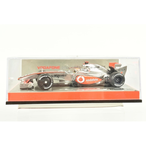 41 - EIGHT MINICHAMP 1.43 SCALE DIECAST MODELS, to include a a Vodafone McLaren Mercedes MP4-27 J Button ... 